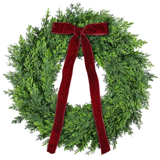 Puleo International 24" Unlit Green Polyethylene Spruce with Red Velvet Bow Artificial Wreath